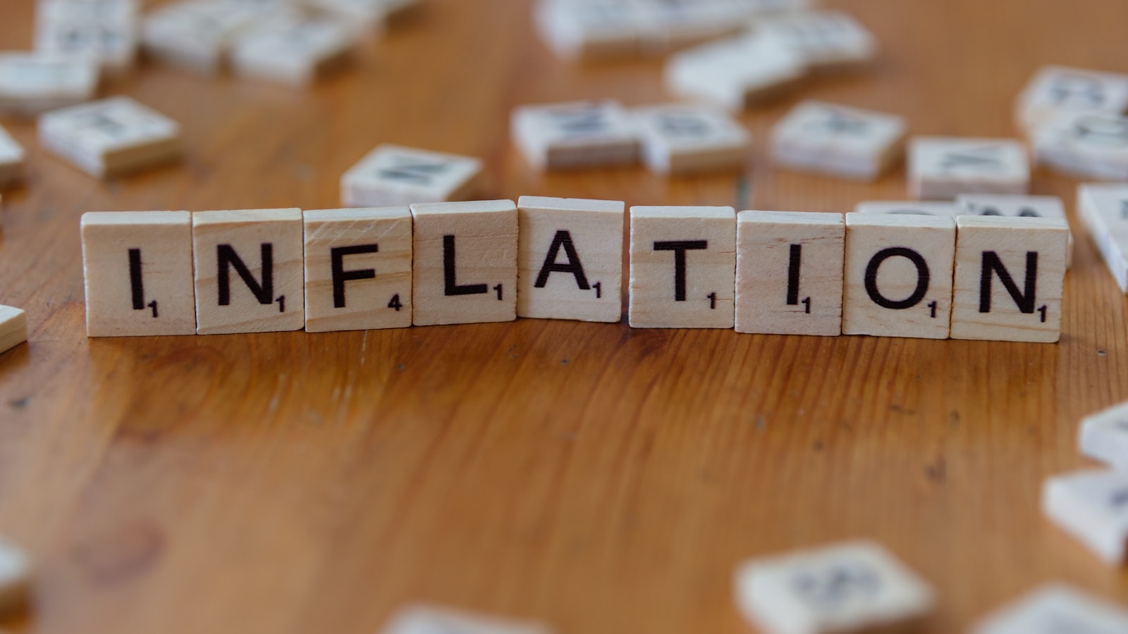 AI-generated editorial illustration of economic gauges showing rising inflation and falling growth, symbolising stagflation risk