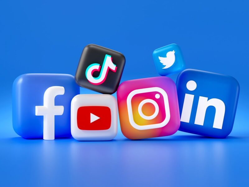AI-generated illustration of a smartphone split between a traditional social media feed and a TikTok-style algorithmic video feed, representing Meta's strategic pivot